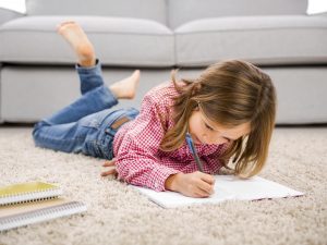 A little girl doing homework
